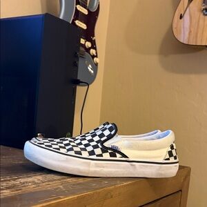 Vans Black and White Checkerboard Pro Slip-Ons